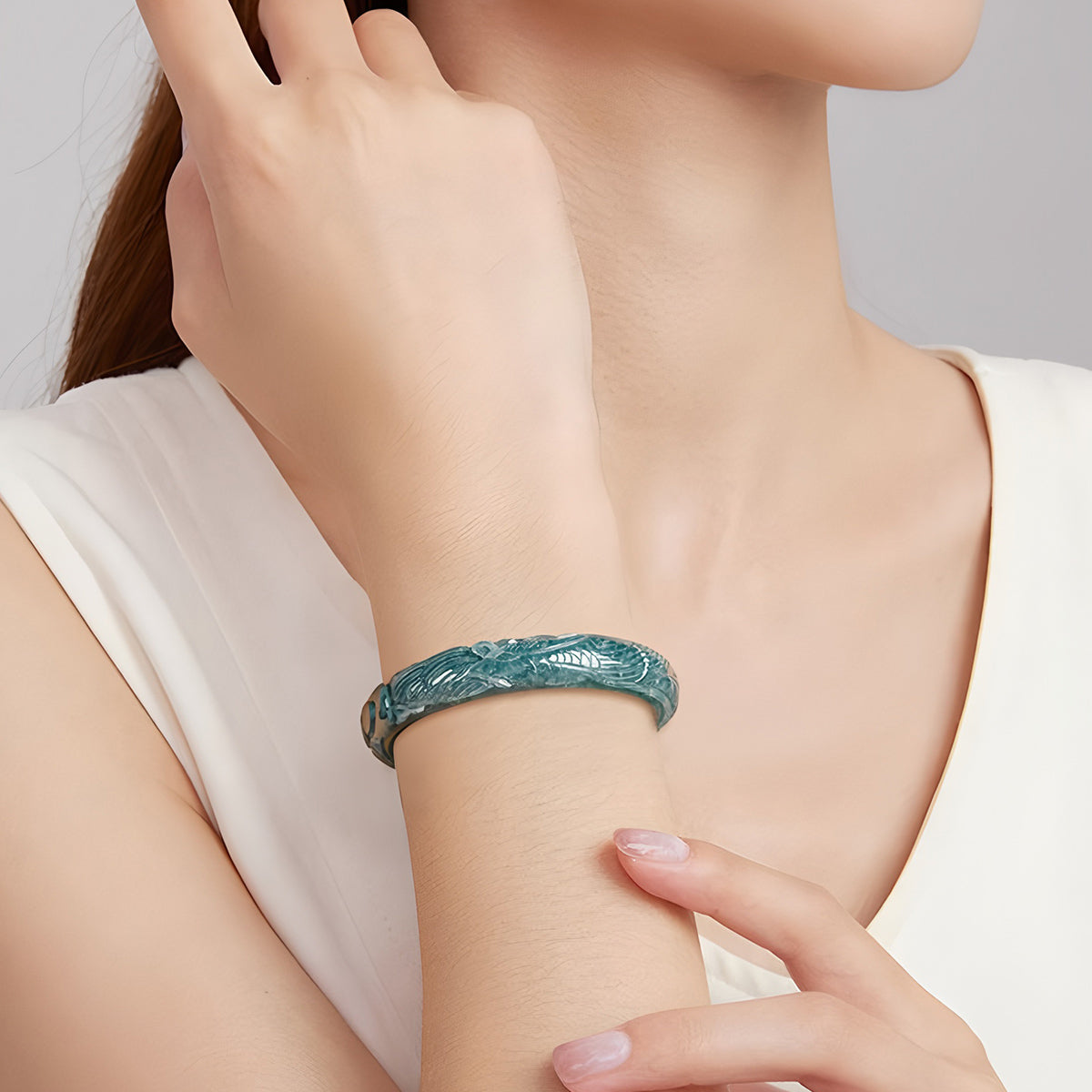 Carved natural Burmese jadeite bracelet