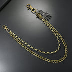 Multi-layered gold waist chain with skull pendant