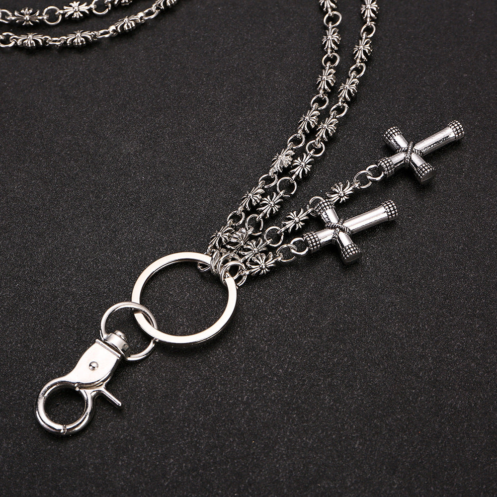 Multi-element cross trouser chain
