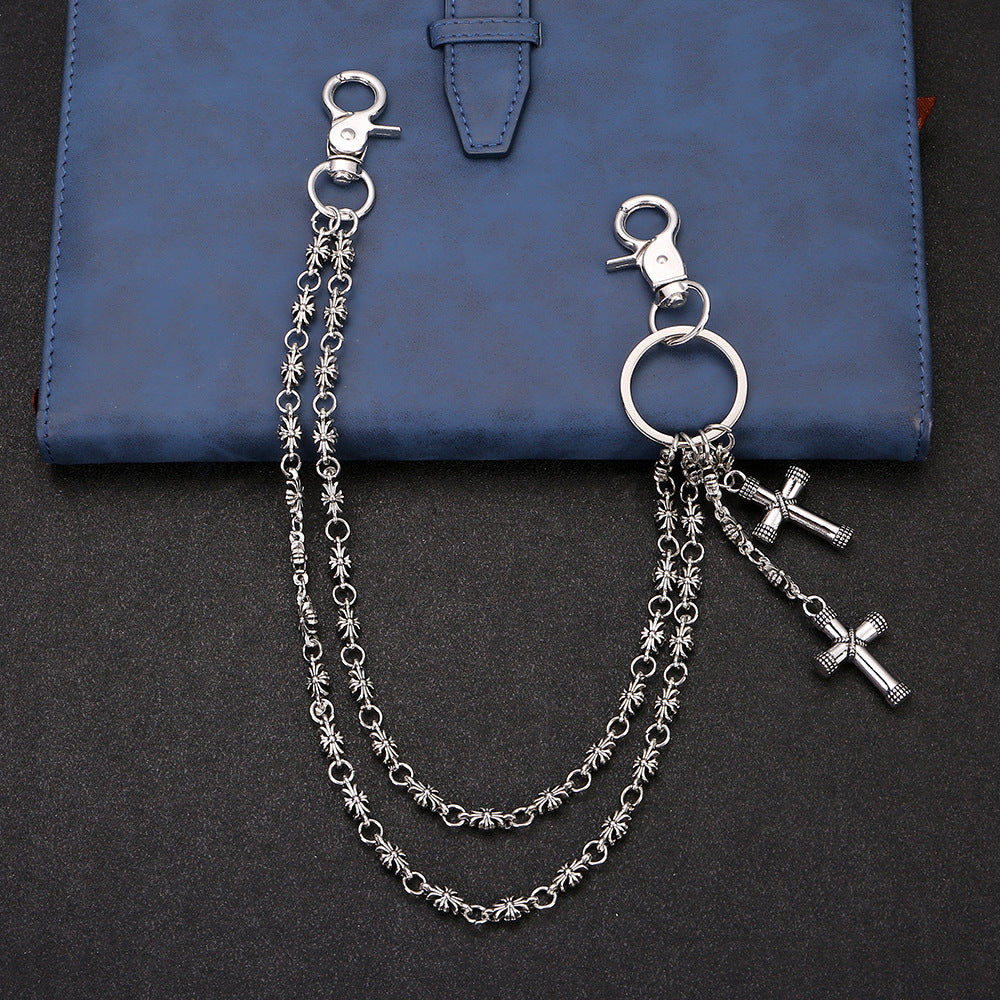 Multi-element cross trouser chain
