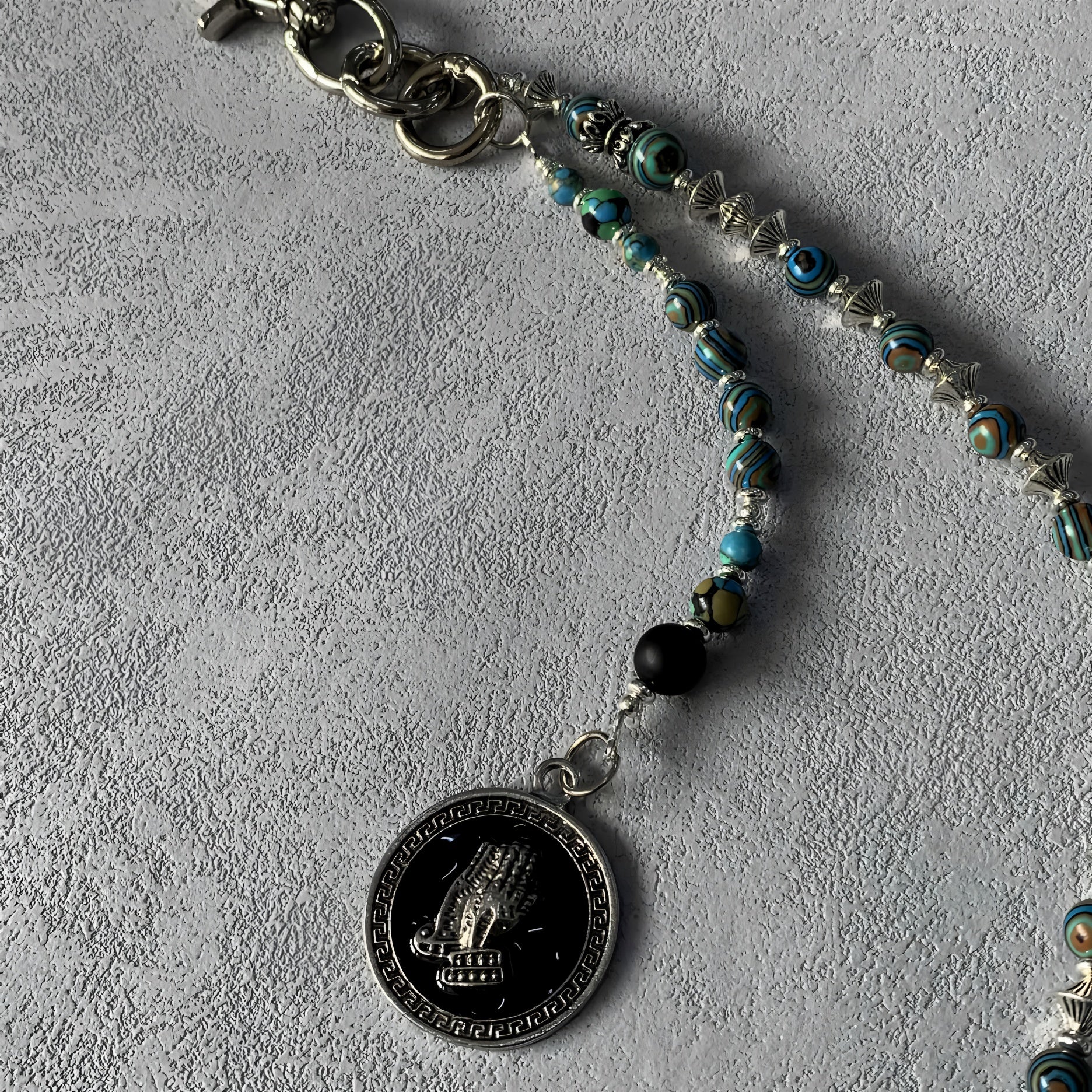 Turquoise, black and silver hand-stitched trouser chain