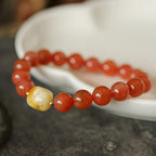 Natural red jade and beeswax beaded bracelet